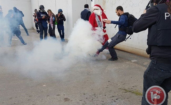 Israeli forces suppress Bethlehem’s ‘Santa Claus march’ with tear gas, rubber bullets
