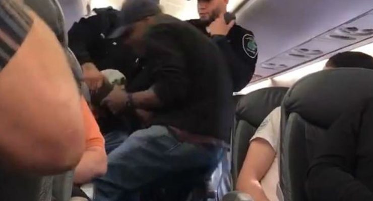 Asian Doctor Violently Pulled Off US Plane by Security Guards