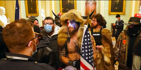 US Capitol riot: the myths behind the tattoos worn by ‘QAnon shaman’ Jake Angeli