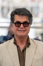 Cheers And Jeers As Cannes-Winning Director Jafar Panahi Returns To Iran